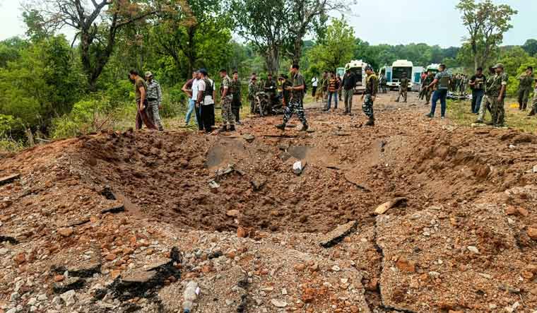 A massive crater formed after a blast triggered by Maoists in Dantewada. Ten DRG personnel were killed in the blast | PTI