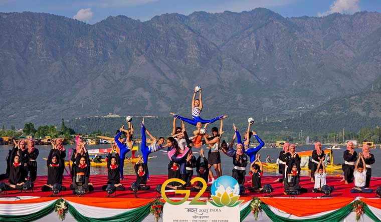 Youngsters perfom during a special sports event at Dal Lake, ahead of G20 Tourism Working Group meeting, in Srinagar | PTI