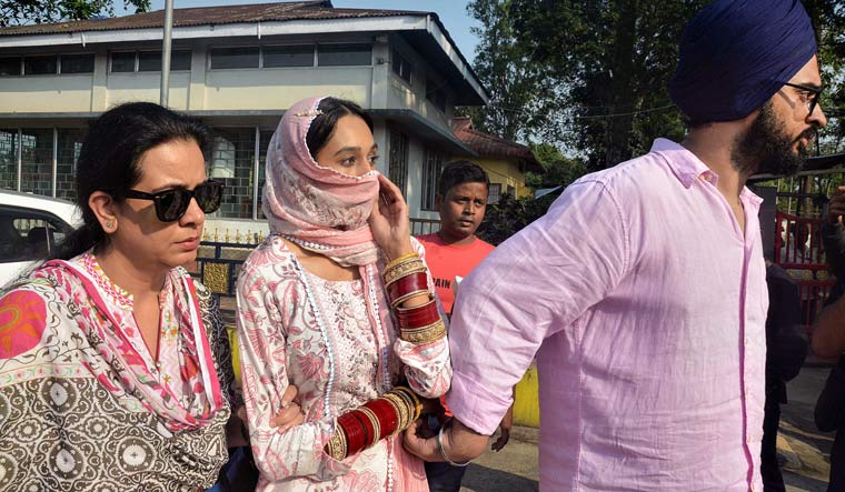 Kirandeep Kaur, wife of Khalistani leader Amritpal Singh, Daljit Kalsis, wife Narinder Kaur (Neeru Kalsi) along with her son Simarjeet Kalsi (Sunny) arrive at Dibrugarh Central Jail, in Dibrugarh | PTI