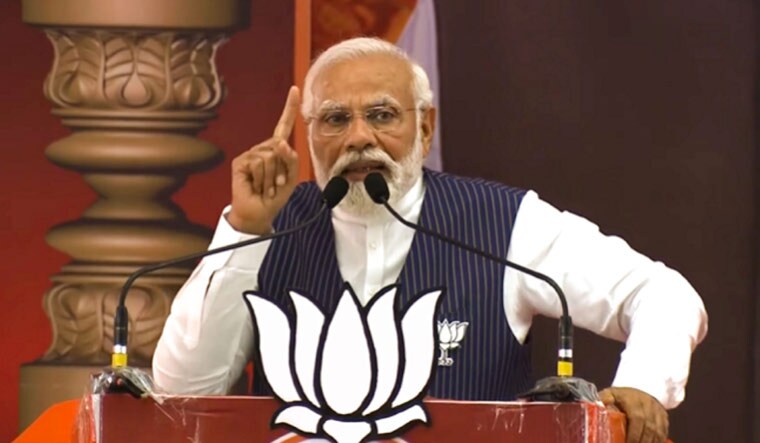 Prime Minister Narendra Modi speaks during a public meeting at Nanjanagudu in Mysuru district of Karnataka | PTI