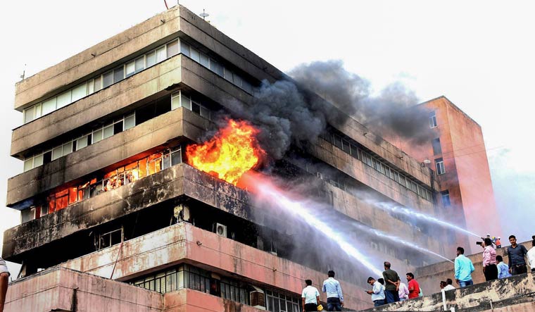 Fire fighters trying to douse fire that broke out on the third floor of Satpura Bhawan in Bhopal | PTI