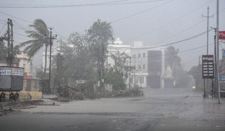  A view of heavy rainfall with strong winds as cyclone Biparjoy starts making landfall at Mandvi, in Kutch