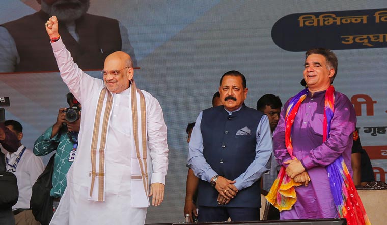 Union Home Minister Amit Shah with Union Minister Jitendra Singh and J&K BJP President Ravinder Raina during a public meeting, at Bhagwati Nagar in Jammu, Friday, June 23, 2023 | PTI