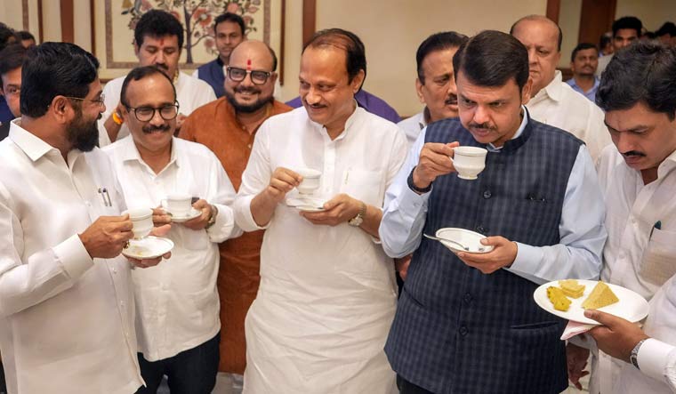 Maharashtra CM Eknath Shinde along with Dy CMs Devendra Fadnavis and Ajit Pawar during a tea party ahead of the Maharashtra assembly monsoon session, in Mumbai | PTI