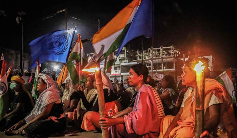 Women take part in a demonstation in Imphal demanding restoration of peace in Manipur | AFP