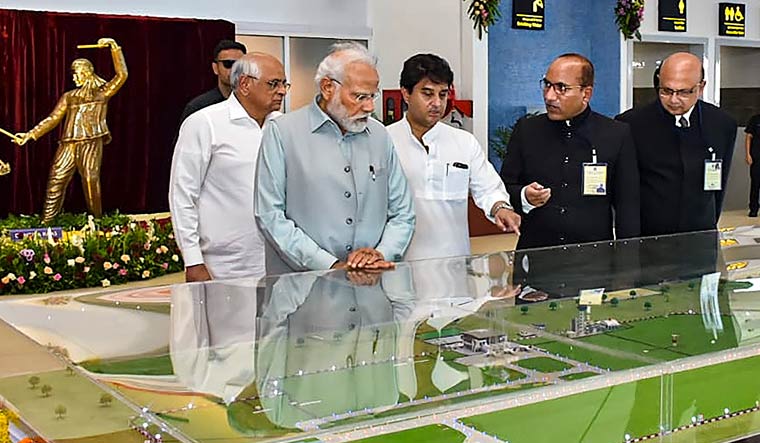 Prime Minister Narendra Modi with Union Minister for Civil Aviation Jyotiraditya Scindia and Gujarat Chief Minister Bhupendra Patel at the newly-inaugurated Rajkot International Airport | PTI