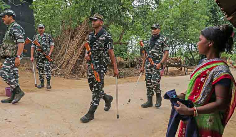Security personnel conduct a march on the eve of West Bengal panchayat elections, in Birbhum district | PTI