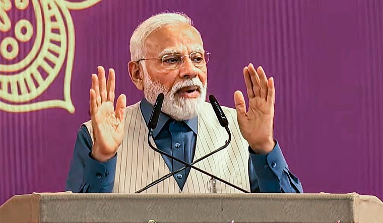 Prime Minister Narendra Modi speaks during the foundation stone laying ceremony of a memorial of Sant Ravidas, in Sagar | PTI