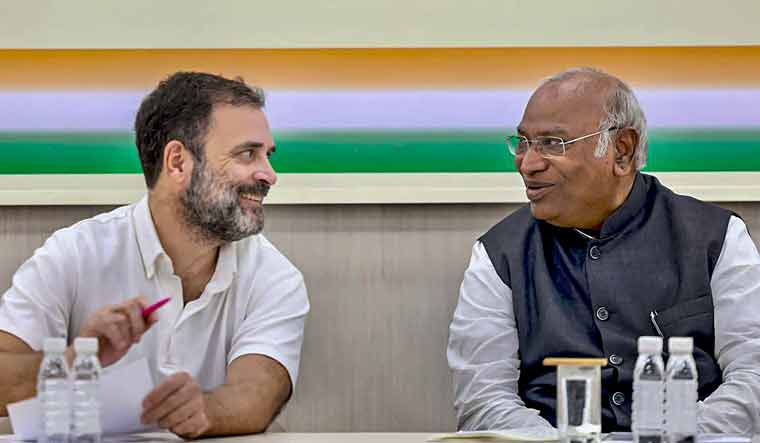 Congress president Mallikarjun Kharge with party leader Rahul Gandhi in a meeting with Delhi Congress leaders | PTI