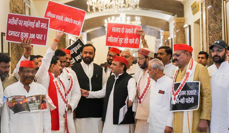 Leader of Opposition in Uttar Pradesh Assembly Akhilesh Yadav with party MLAs arrives at Vidhan Bhawan to attend the Monsoon session of UP Assembly, in Lucknow | PTI