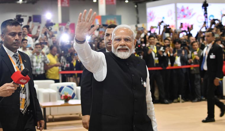 Prime Minister Narendra Modi greets mediamen at International Media Centre to conclude the G20 Summit | Sanjay Ahlawat