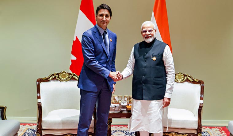 Prime Minister Narendra Modi with Canadian Prime Minister Justin Trudeau during a meeting on the sidelines of the G20 Summit | PTI