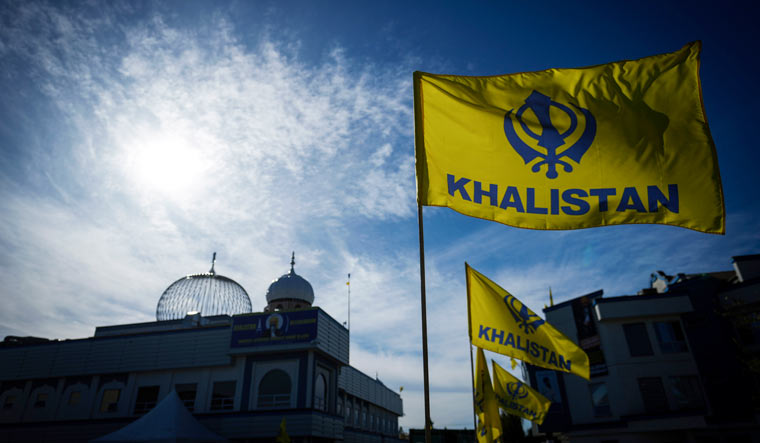 Khalistan flags are seen outside the Guru Nanak Sikh Gurdwara Sahib in Surrey, British Columbia | AP