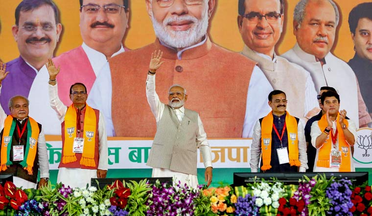 Bhopal: Prime Minister Narendra Modi waves at supporters during BJP's 'Karyakarta Mahakumbh', in Bhopal, Monday, Sept. 25, 2023 | PTI