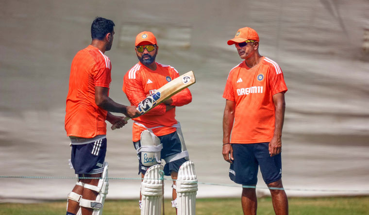 India's head coach Rahul Dravid, captain Rohit Sharma and R Ashwin during a practice session ahead of the second Test match against South Africa | PTI