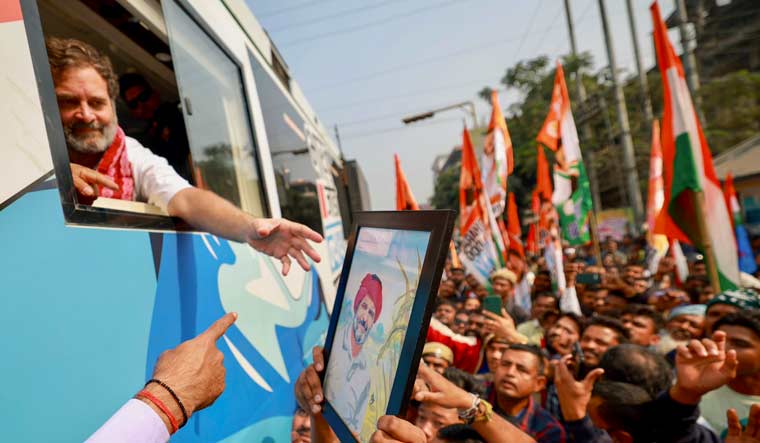Congress leader Rahul Gandhi greets supporters during 'Bharat Jodo Nyay Yatra', in Biswanath district, Assam | PTI