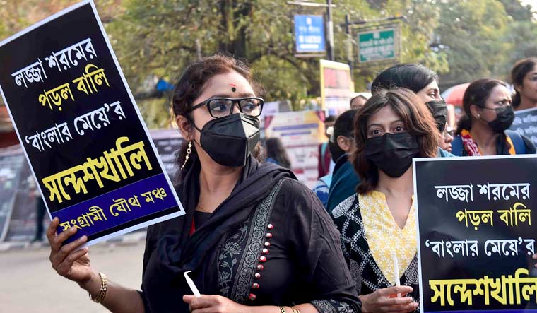 Members of Sangrami Joutha Mancha stage protest over the Sandeshkhali case, in Kolkata | PTI