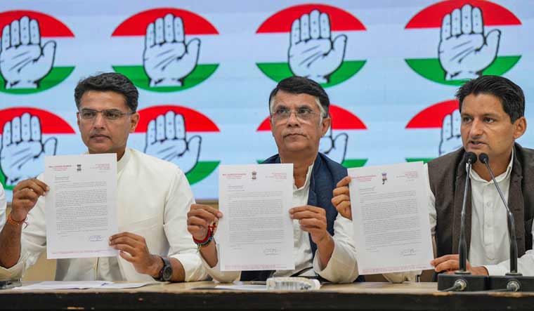 Congress leaders Sachin Pilot, Pawan Khera and Deepender Singh Hooda during a press conference, at AICC headquarters, in New Delhi | PTI
