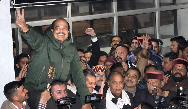 BJP candidate Harsh Mahajan celebrates after being elected as Rajya Sabha member at the Himachal Pradesh Assembly complex, in Shimla | PTI