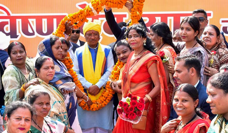 Chhattisgarh Chief Minister Vishnu Deo Sai being garlanded on his arrival for the inauguration and foundation stone laying ceremony of various developmental projects, in Narayanpur | PTI