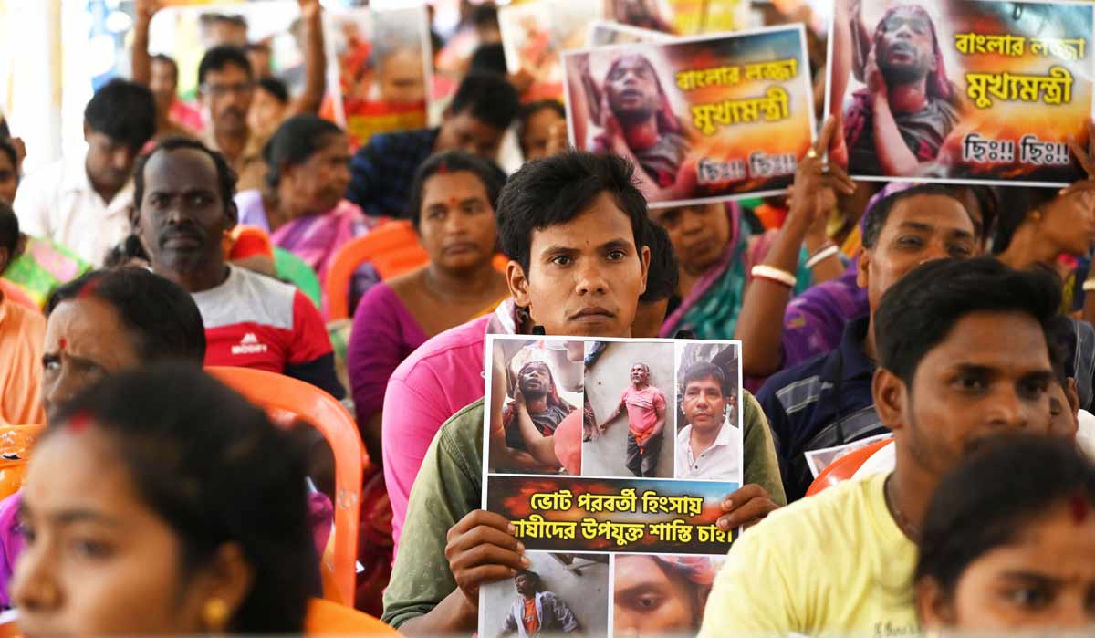 BJP workers attend a dharna organised by the party outside the Raj Bhavan to protest against the post-poll violence in the state | Salil Bera