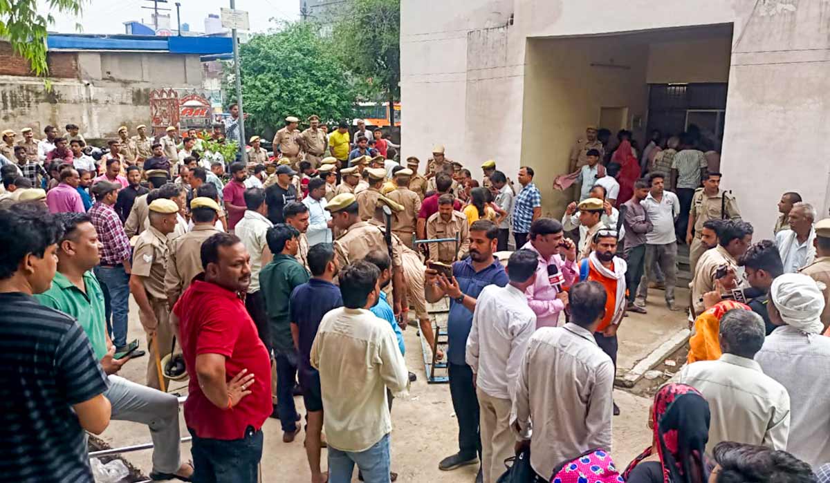 Relatives wait outside a hospital where victims of the Hathras' stampede are admitted, on Tuesday | PTI