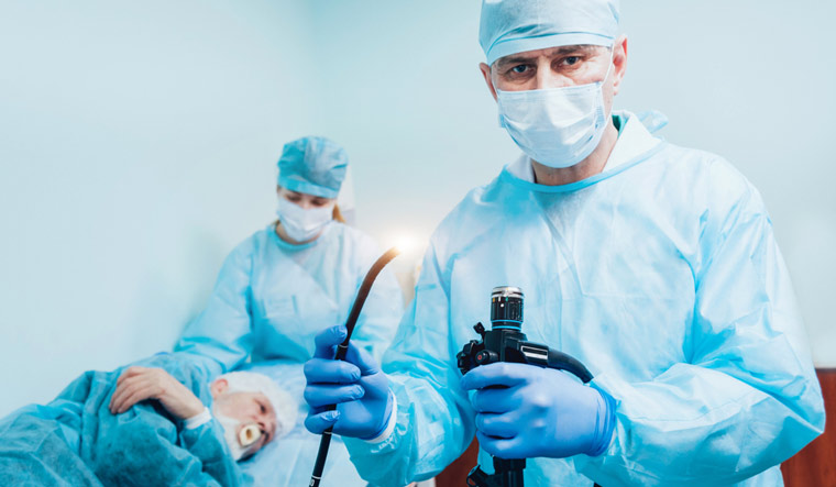 Endoscopy-at-hospital-Doctor-holding-endoscope-before-gastroscopy-shut