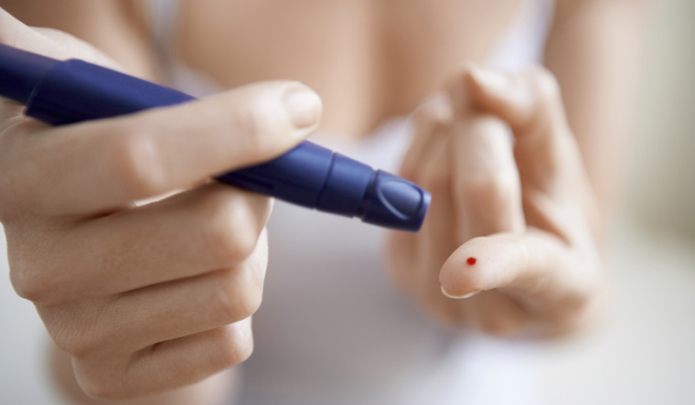 woman-lancelet-on-finger-Diabetes-diabetic-blood-sugar-shut