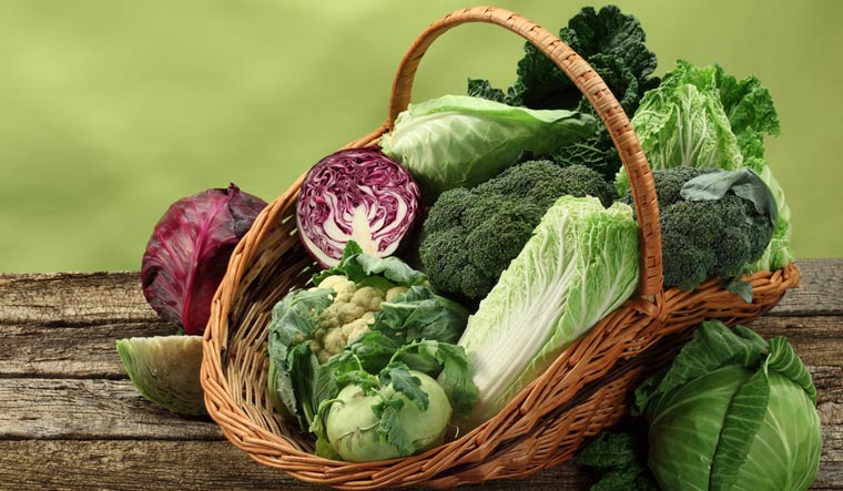 Different-types-of-cabbage-in-a-basket-vegetables-shut