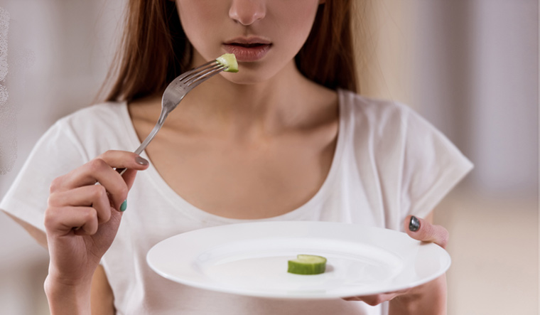 bad-eating-Anorexia-thin-girl-malnutrition-harms-health-shut