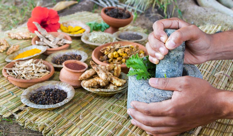 preparation-ayurvedic-medicine-with-granite-mortar-pestle-alternative-medicine-shut
