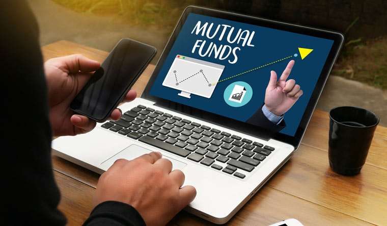 finance-mutual-fund-stock-investment-plan-laptop-shut