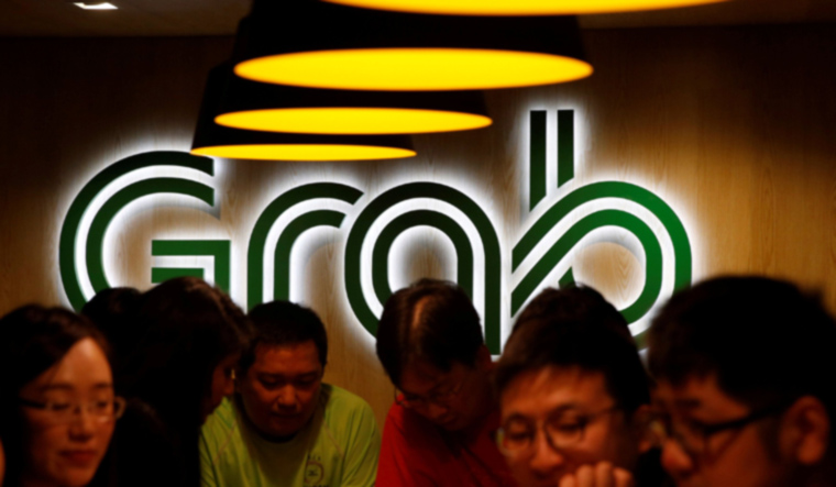 New hires relax at a lounge area in a Grab office 