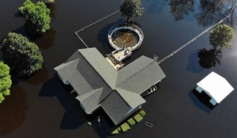 Flood waters isolate homes in the aftermath of Hurricane Florence September 19, 2018 ian Lumberton, North Carolina | PTI