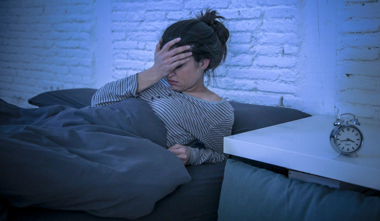 Sleep-loss-deprivation-woman-sleep-awake-night-insomnia-tired-shut