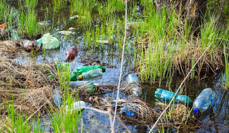 environmental-pollution-plastic-waste-bottles-shut