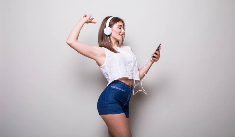 music-listening-girl-smartphone-shut