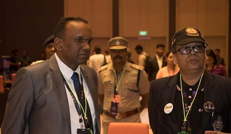 ADGP Manoj Abraham and DGP Loknath Behera during the CoCon conference in Kochi