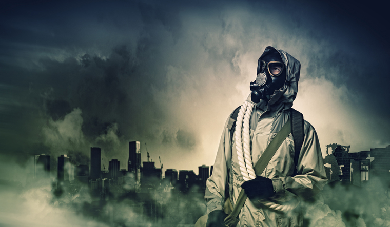 Man-in-gas-mask-disaster-background-shut