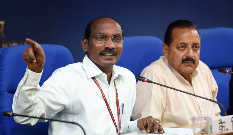 ISRO Chairperson K. Sivan speaks as MoS in the Department of Atomic Energy and Department of Space Jitendra Singh looks on during a press conference in New Delhi | PTI