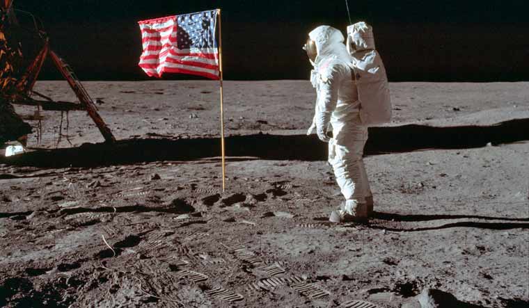 In this July 20, 1969 photo made available by NASA, astronaut Buzz Aldrin Jr. poses for a photograph beside the U.S. flag on the moon during the Apollo 11 mission. Aldrin and fellow astronaut Neil Armstrong were the first men to walk on the lunar surface with temperatures ranging from 243 degrees above to 279 degrees below zero. Astronaut Michael Collins flew the command module | AP