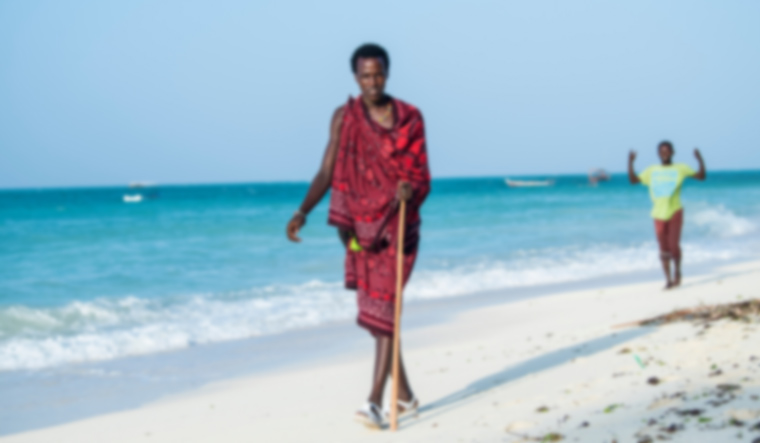 Masai-warriors-sand-beach-of-Zanzibar-island-beach--shut