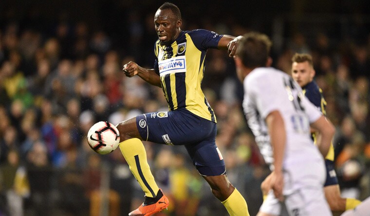 Usain Bolt playing for A-League club Central Coast Mariners | AFP