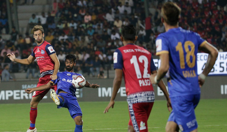 MD Rafique, second from left, of Mumbai City FC fights for ball with Mario Blasco of Jamshedpur FC | AP