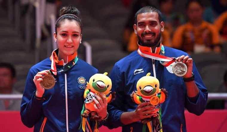 [File] Manika Batra (left) and Sharath Kamal won a historic bronze in the mixed doubles event in the Asian Games | AFP