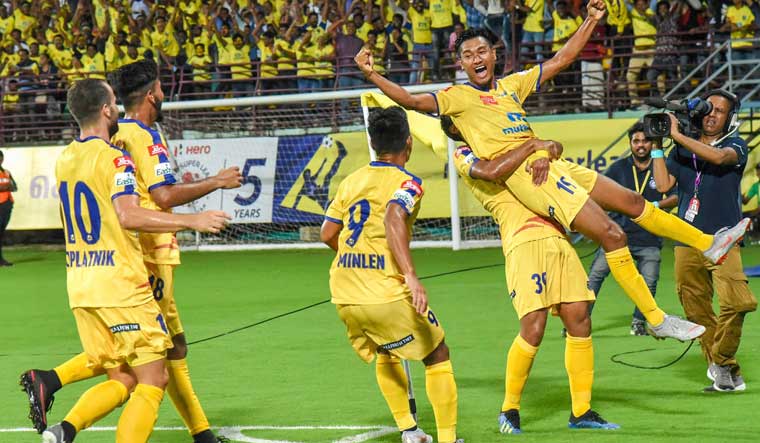 Kerala Blasters FC footballer Halicharan Narzary celebrates after scoring a goal against Mumbai FC during the ISL 5 match, at the Jawaharlal Nehru International Stadium in Kochi | PTI