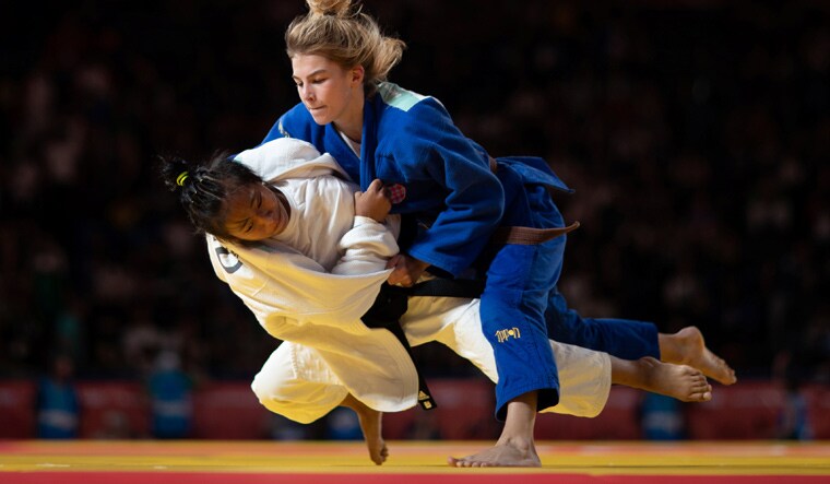 India's Thanjam Tababi Devi (white) and Ana Viktorija Puljiz of Croatia during the judo womens 44kg semifinal at the Asia Pavilion, Youth Olympic Park | Handout via Reuters