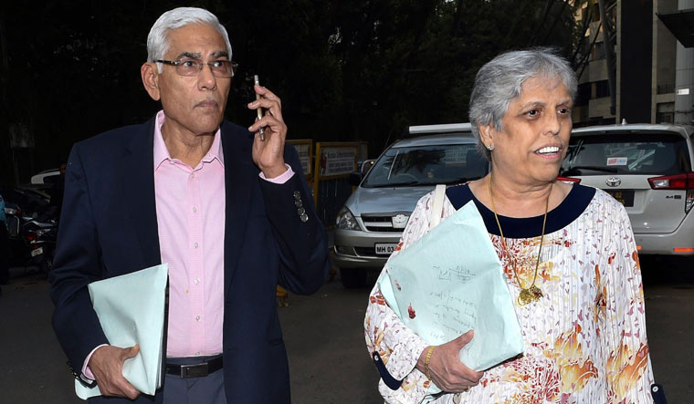 Chief of the Committee of Administrators (CoA) Vinod Rai along with CoA member Diana Edulji leave the BCCI headquarters after a meeting, in Mumbai | PTI