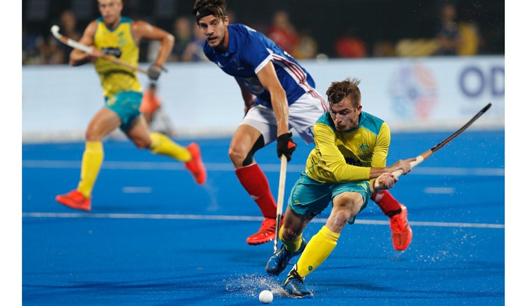 Australia's Jake Whetton (right) takes control of the ball during their quarterfinal match against France | AP