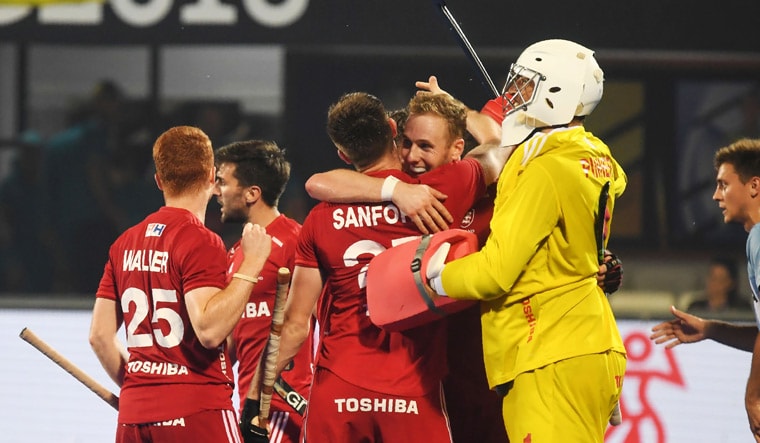 England players celebrate after winning their quarterfinal match against Argentina | AFP